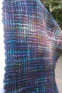 Closeup of the coloured log cabin weave
